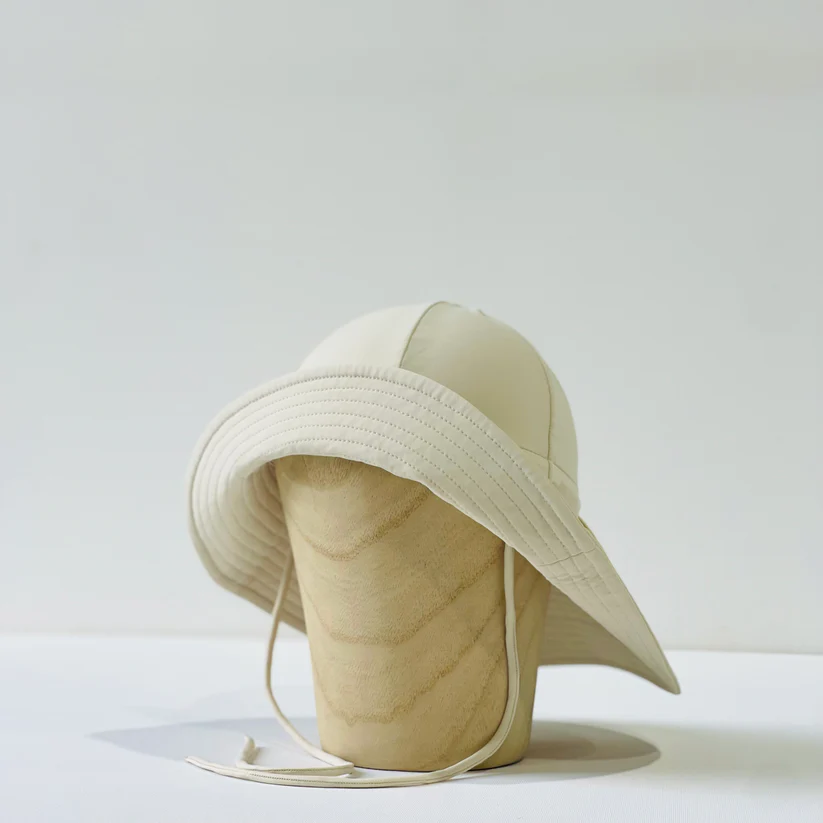 floppy hat | swim | cream