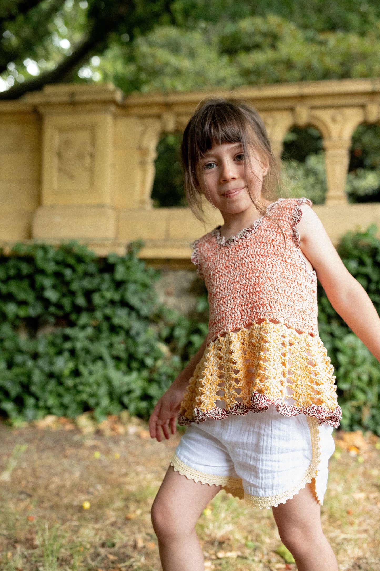 Peplum Top MEI/POPPIES