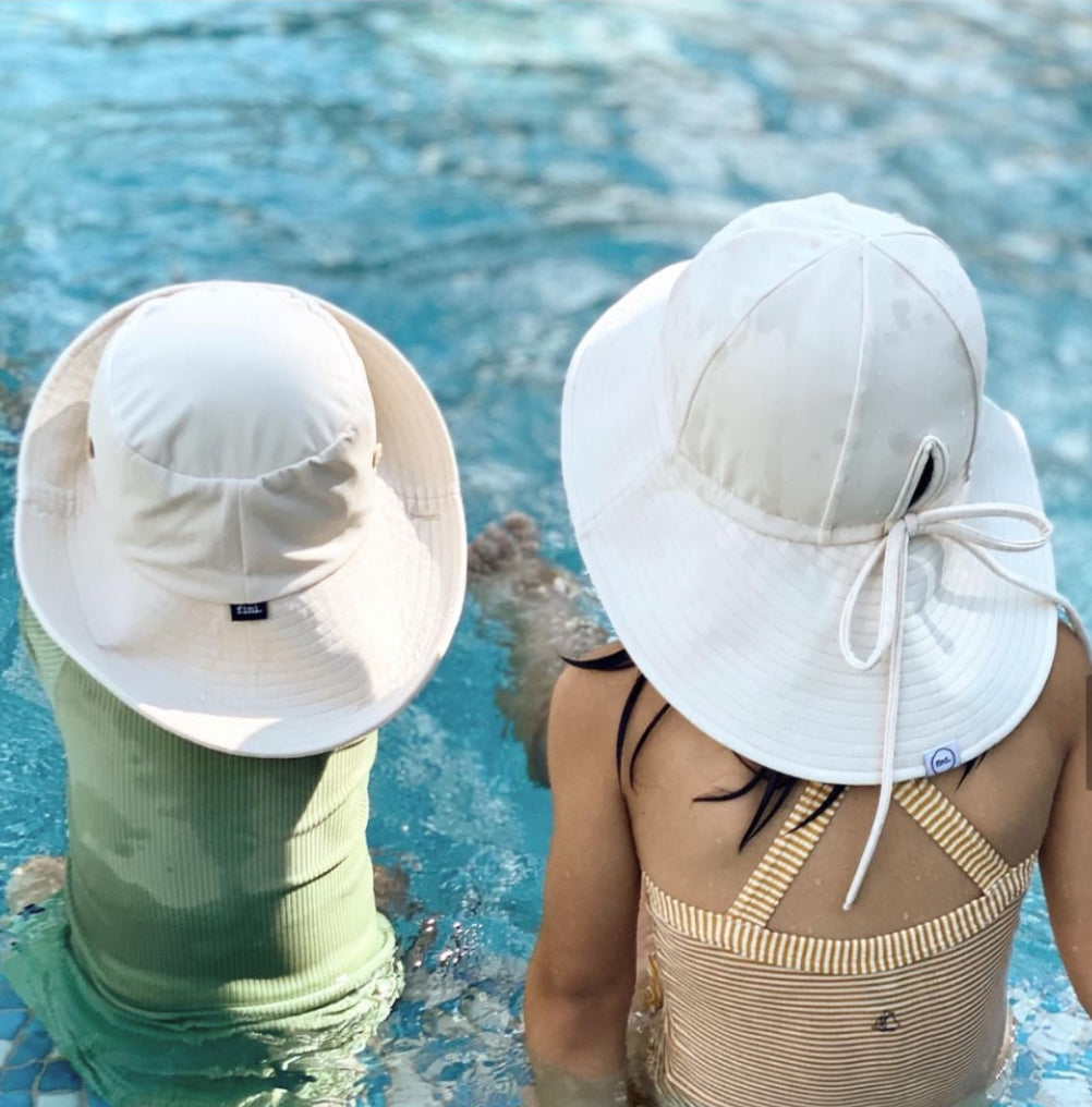 floppy hat | swim | cream