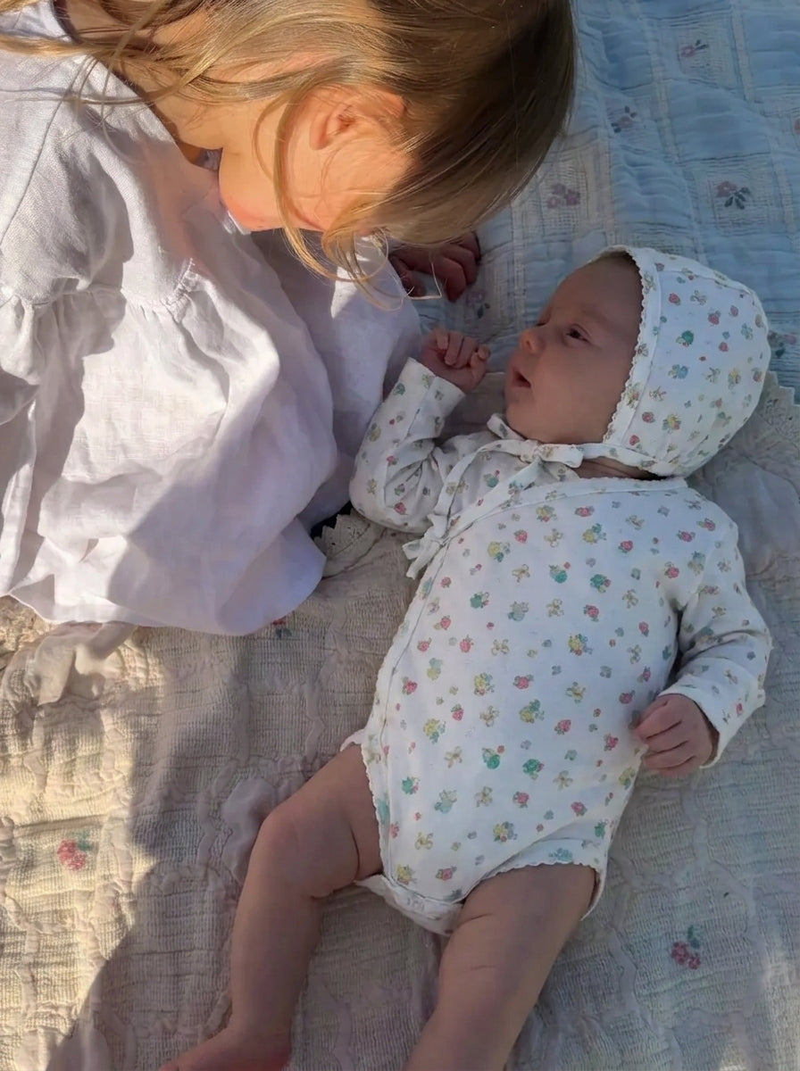 Nia Wrap Onesie/Strawberry Field
